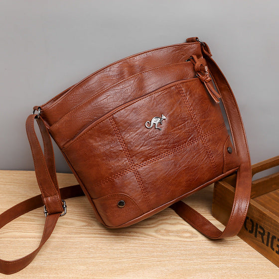 Kuriertasche aus weichem Leder mit mehreren Taschen und großer Kapazität