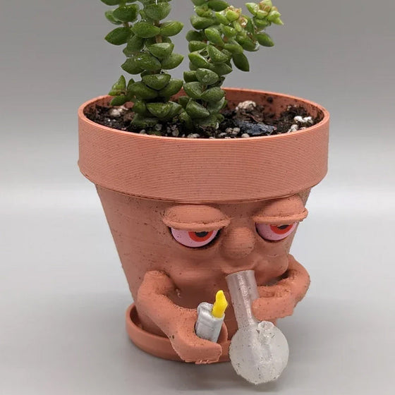 Kreativer rauchender Blumentopf