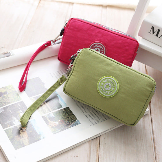 Lässige wasserdichte Clutch mit Handschlaufe