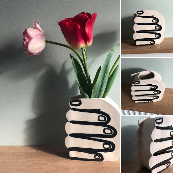 Einzigartige Handvase