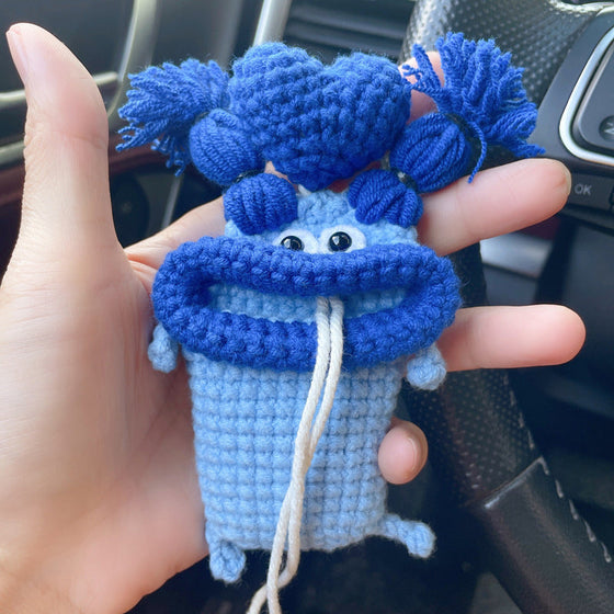 Kreatives ausziehbares Schlüsseletui aus handgestrickter Wolle